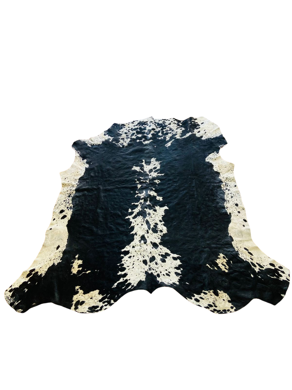 BLACK AND WHITE COW HIDE RUG