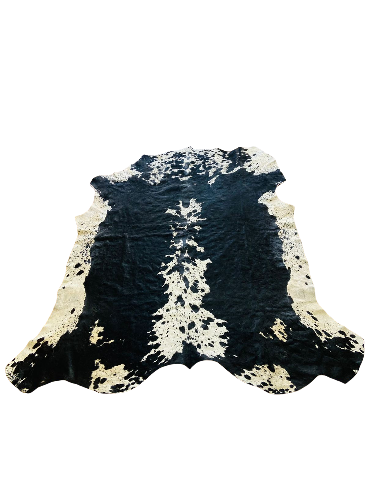 BLACK AND WHITE COW HIDE RUG