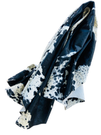 FOLDED BLACK AND WHITE COWHIDE