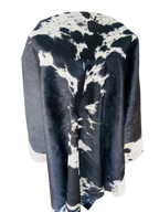 BLACK AND WHITE COW HIDE RUG
