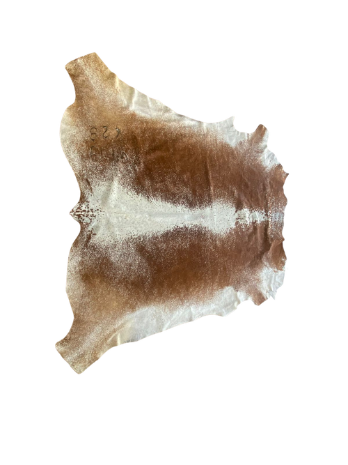 Hides of brown and white cowhide 