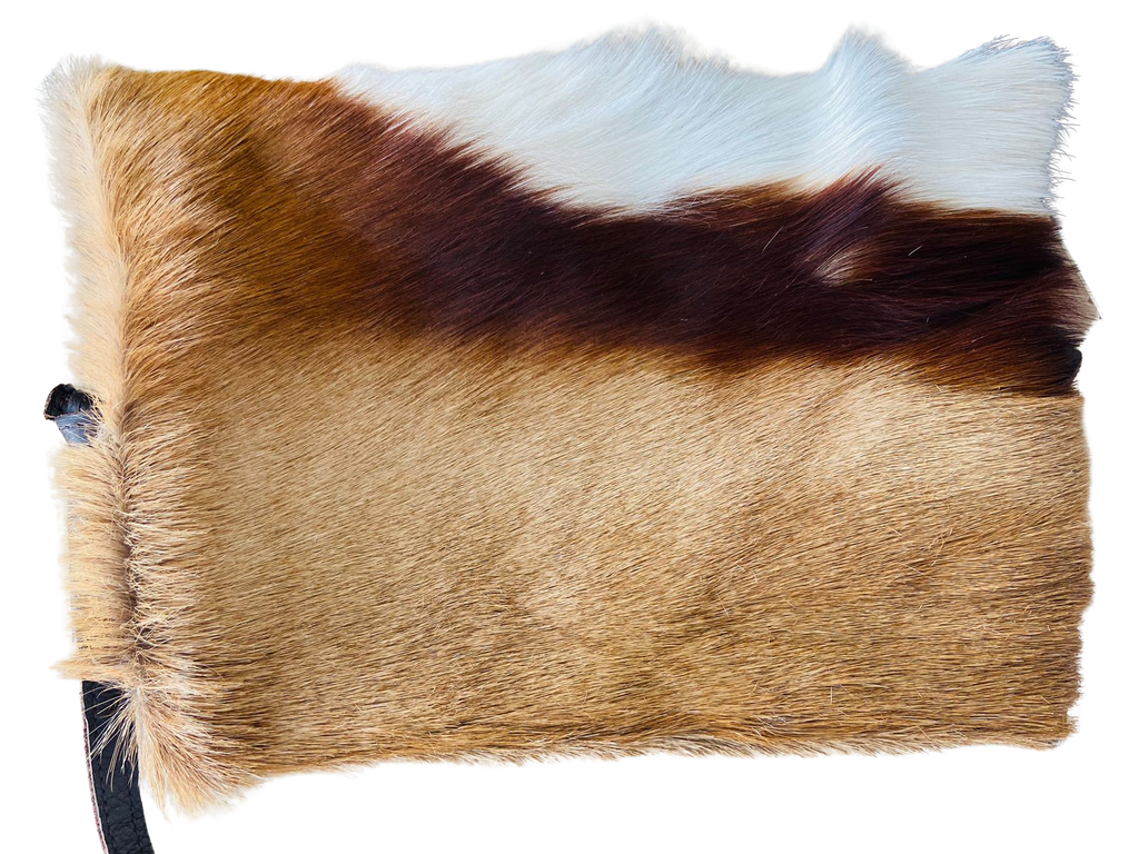 Horse hair pouch with brown, black, and white pattern on a white background