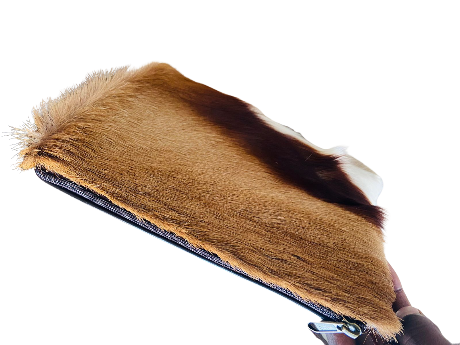 Fur-covered product with a zipper on a white background