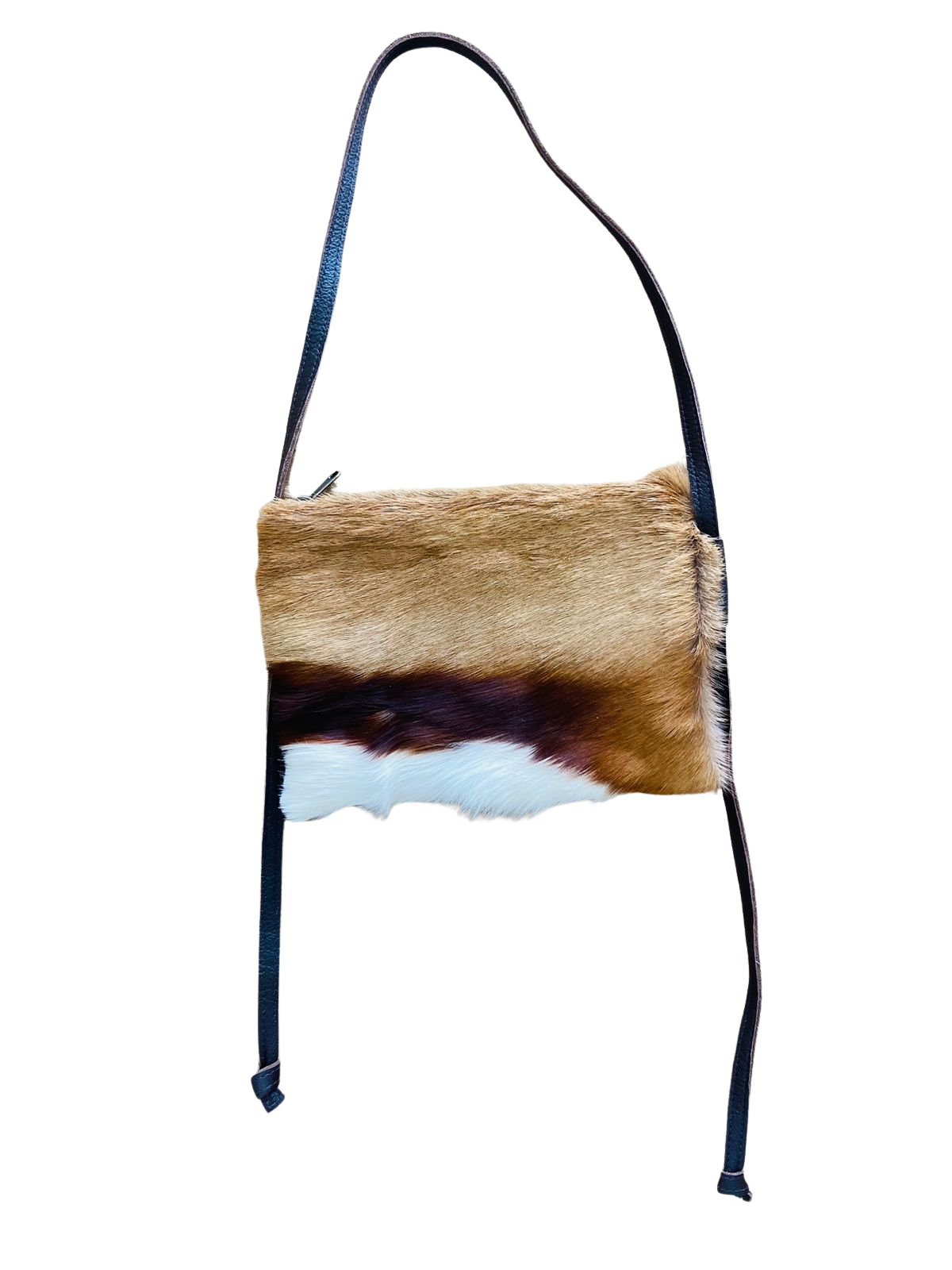 Brown and white Springbok hide bag with black strap on a white background