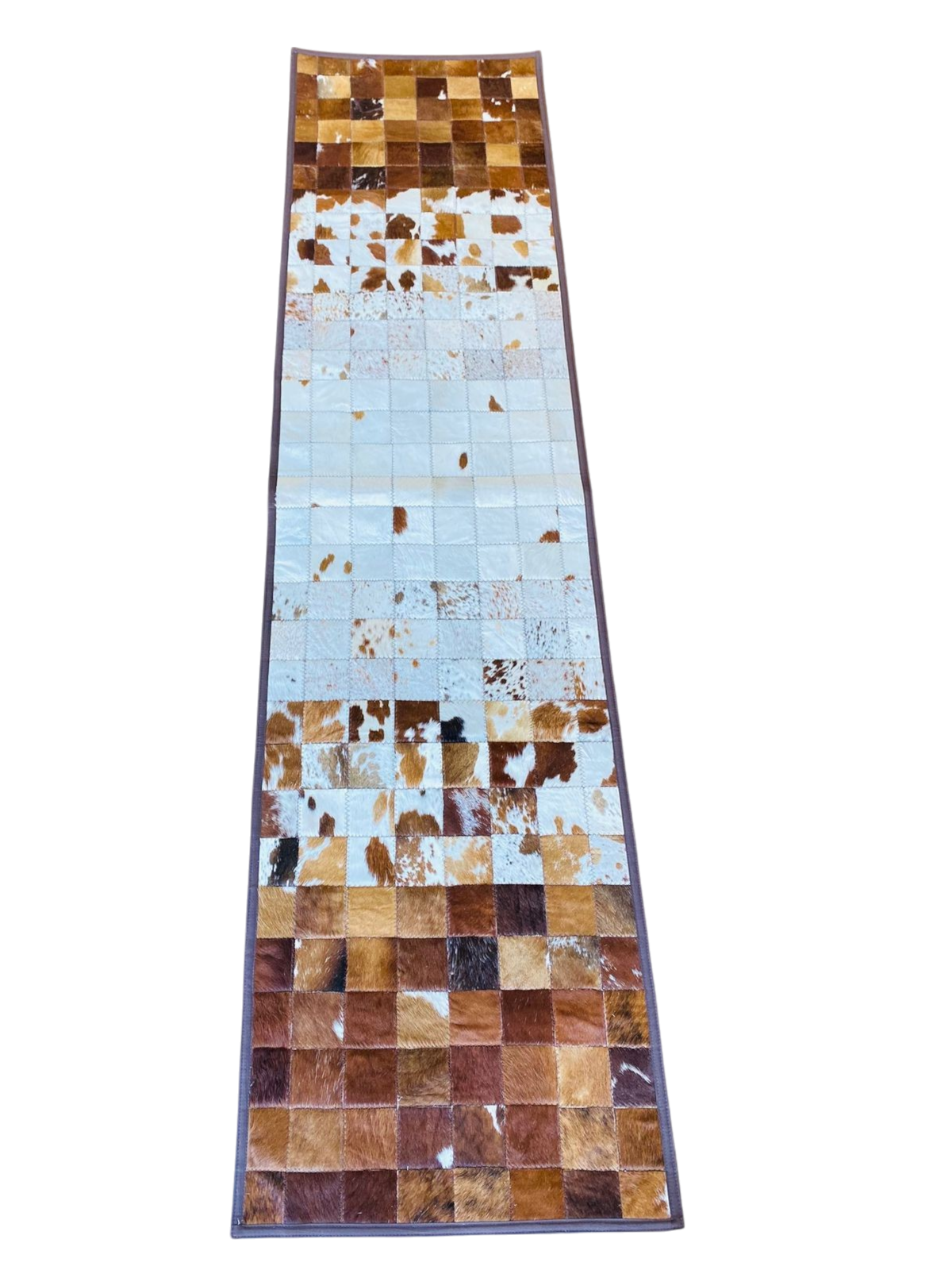 Patchwork cowhide rug with brown and beige squares 
